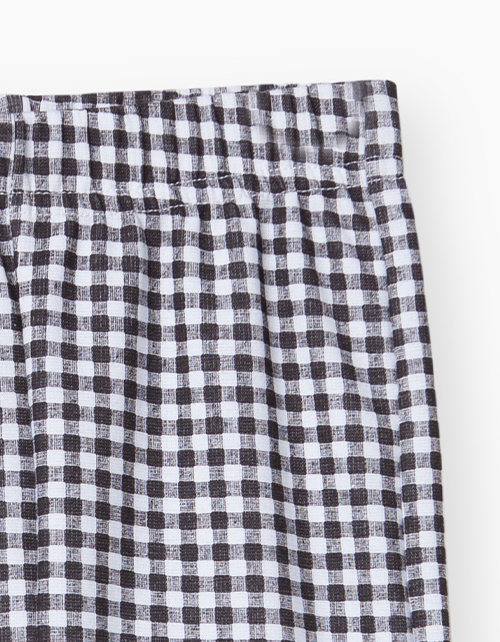 Купить брюки-джеггинсы в клетку для девочки