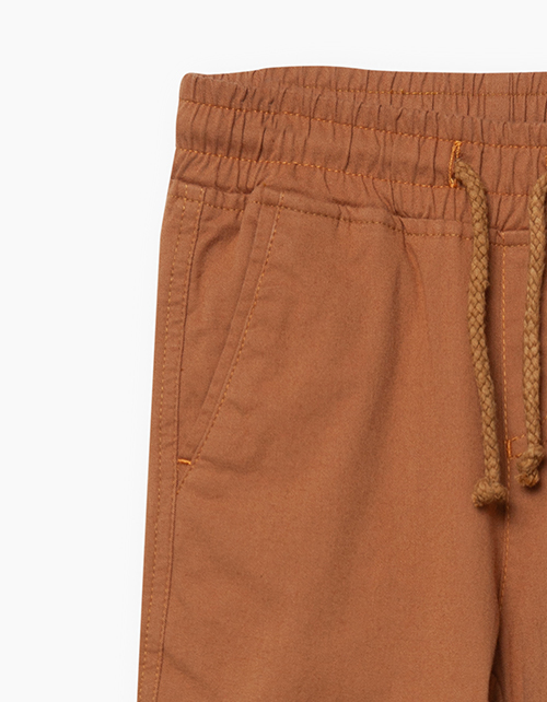 Купить песочные брюки-чиносы для мальчика