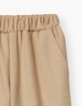 Купить светло-бежевые брюки для девочки