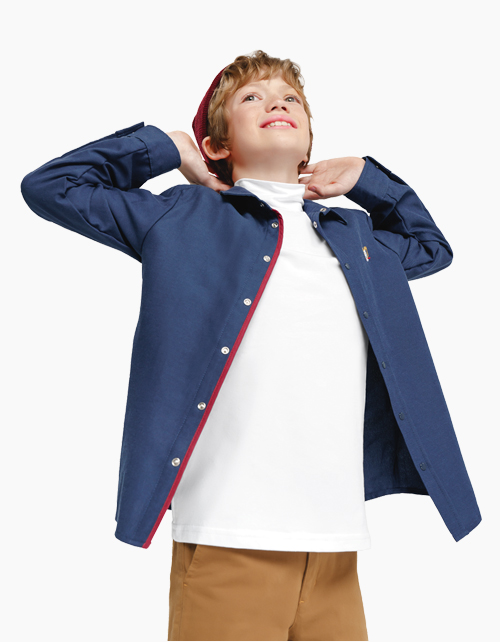 Белый джемпер-водолазка для мальчика Белый джемпер-водолазка для мальчика