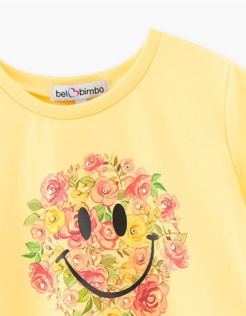 Светло-желтая футболка с принтом для девочки