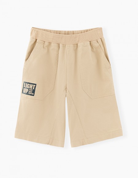 Бежевые шорты для мальчика