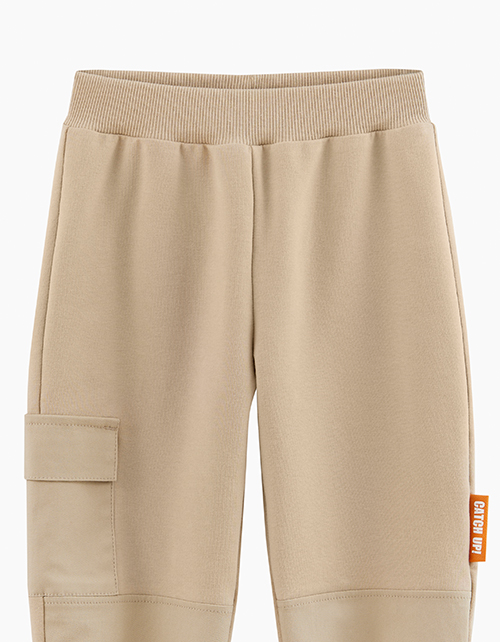 Бежевые брюки-джоггеры для мальчика
