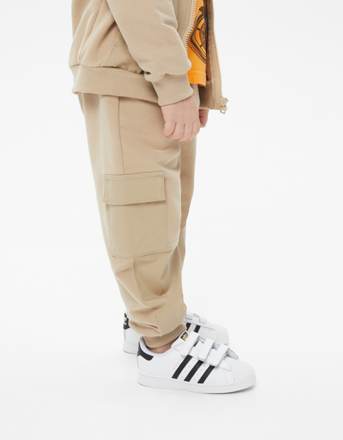 Бежевые брюки-джоггеры для мальчика