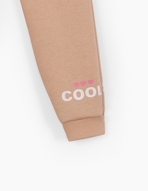 Бежевые брюки-джоггеры для девочки Бежевые брюки-джоггеры для девочки