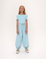 Светло-бирюзовые брюки-аладдины для девочки